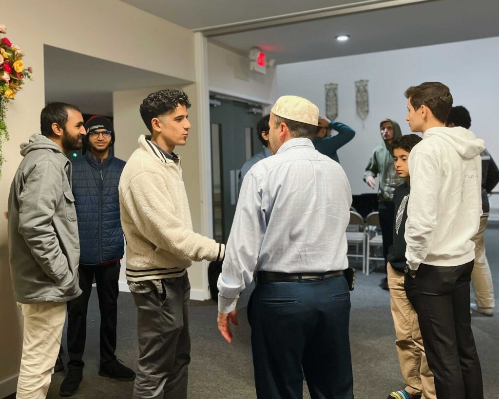 iqra-center-men-handshake